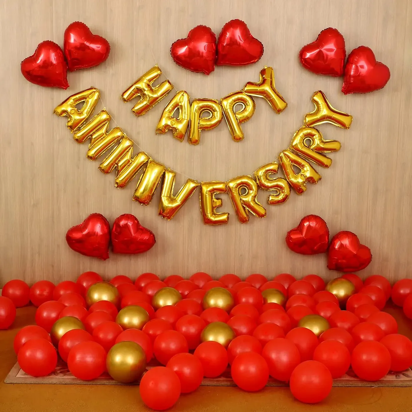 Elegant anniversary table decoration with rose petals, Gurugram
